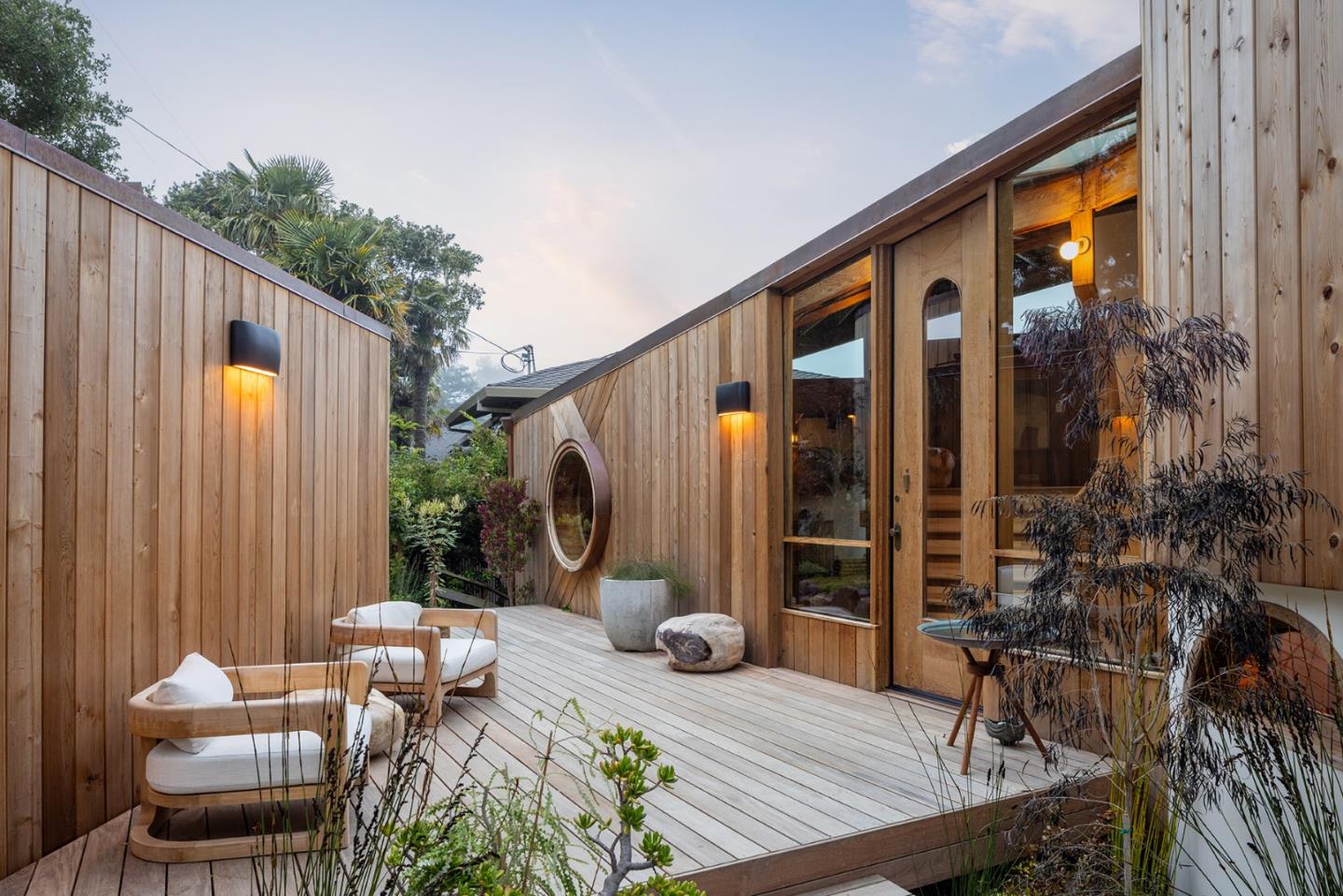 a outdoor living space with furniture and a potted plant