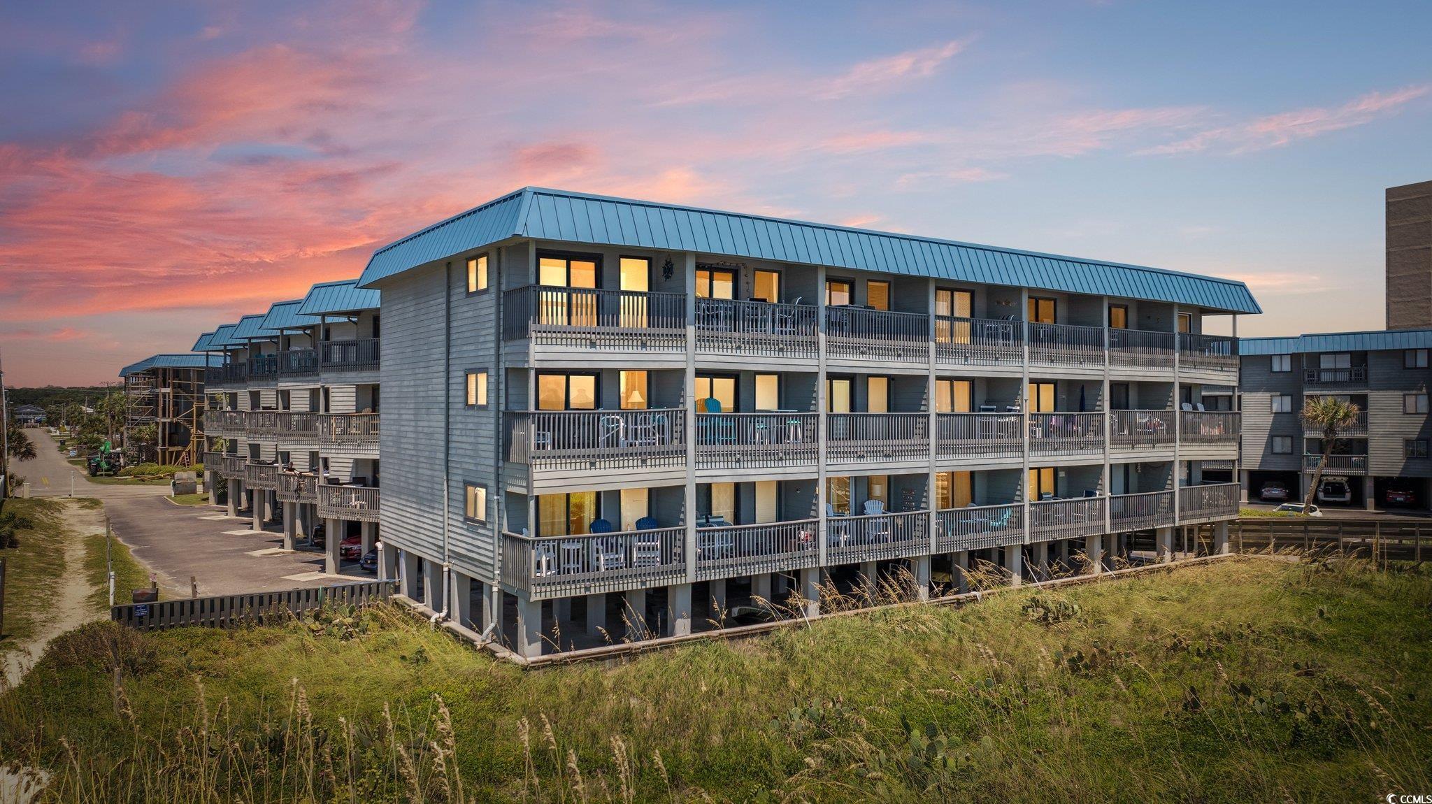 View of outdoor building at dusk