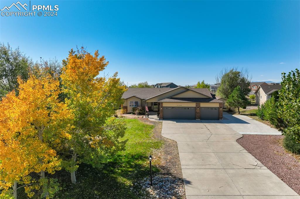 View of front of house with a garage