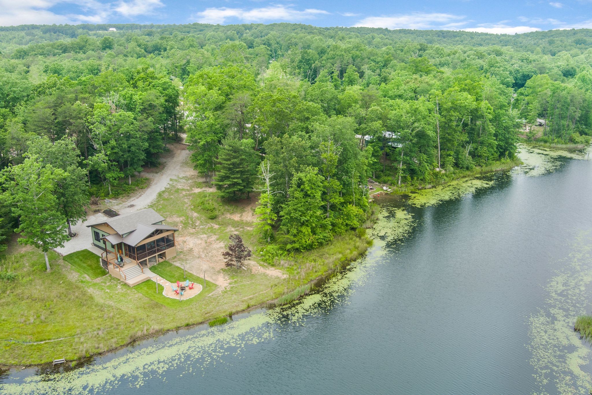 a view of a lake with a yard