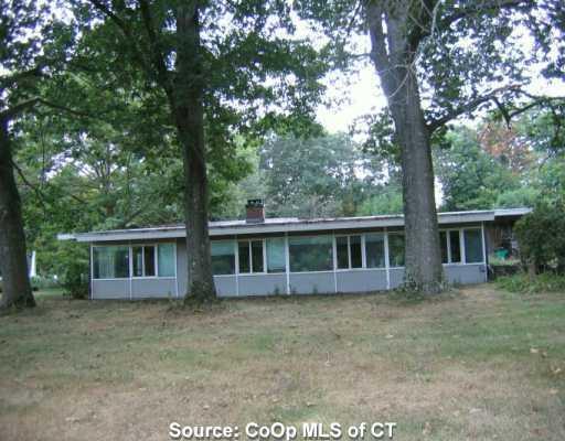 front view of house with a yard