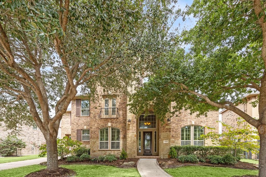 Traditional Trendmaker home on a quiet street backing to a greenbelt.