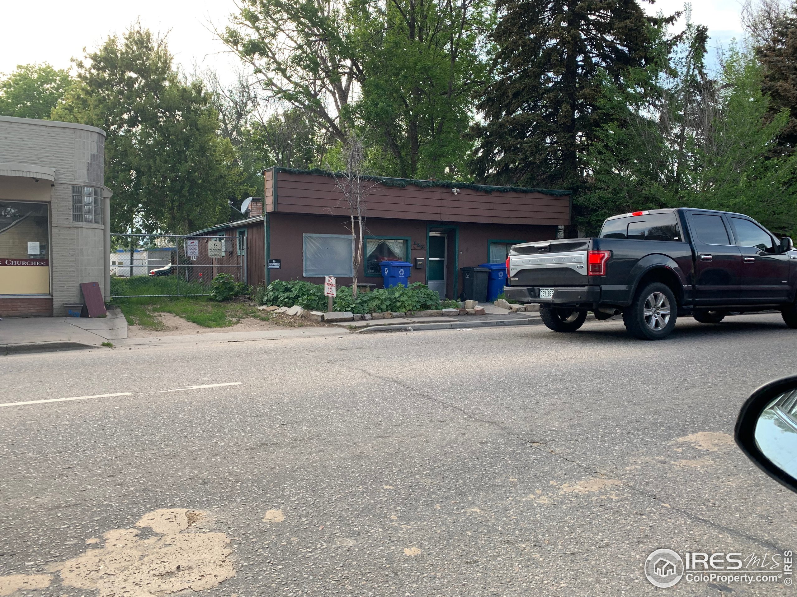 a car parked in front of a house