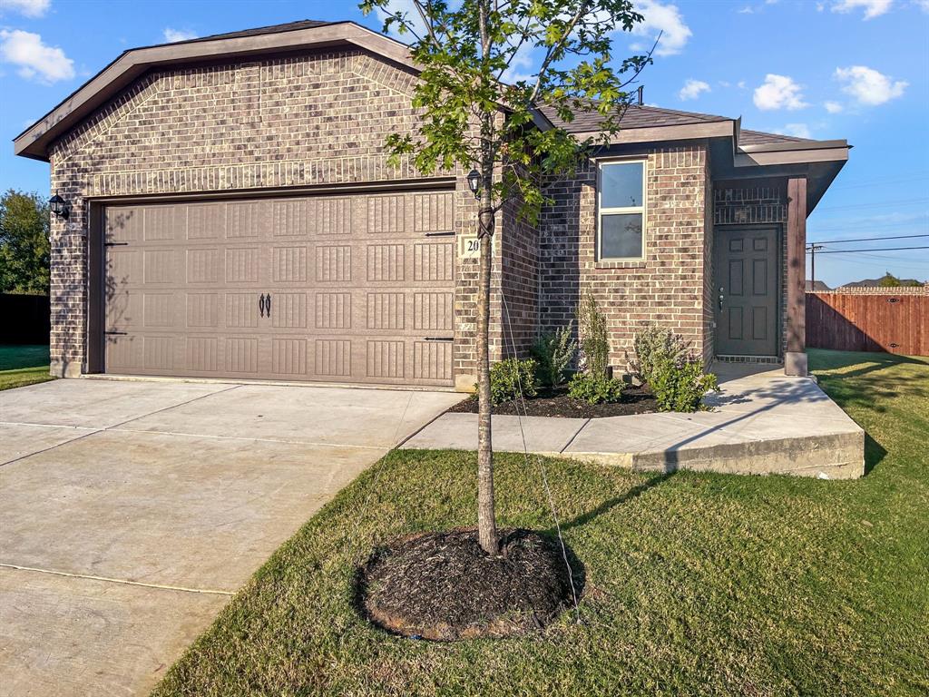 a house view with a garden space