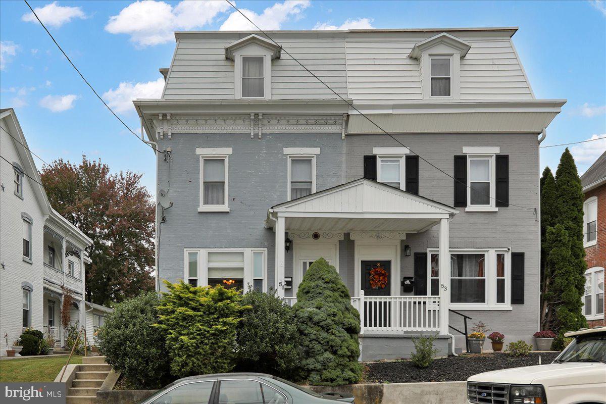 a front view of a house with balcony