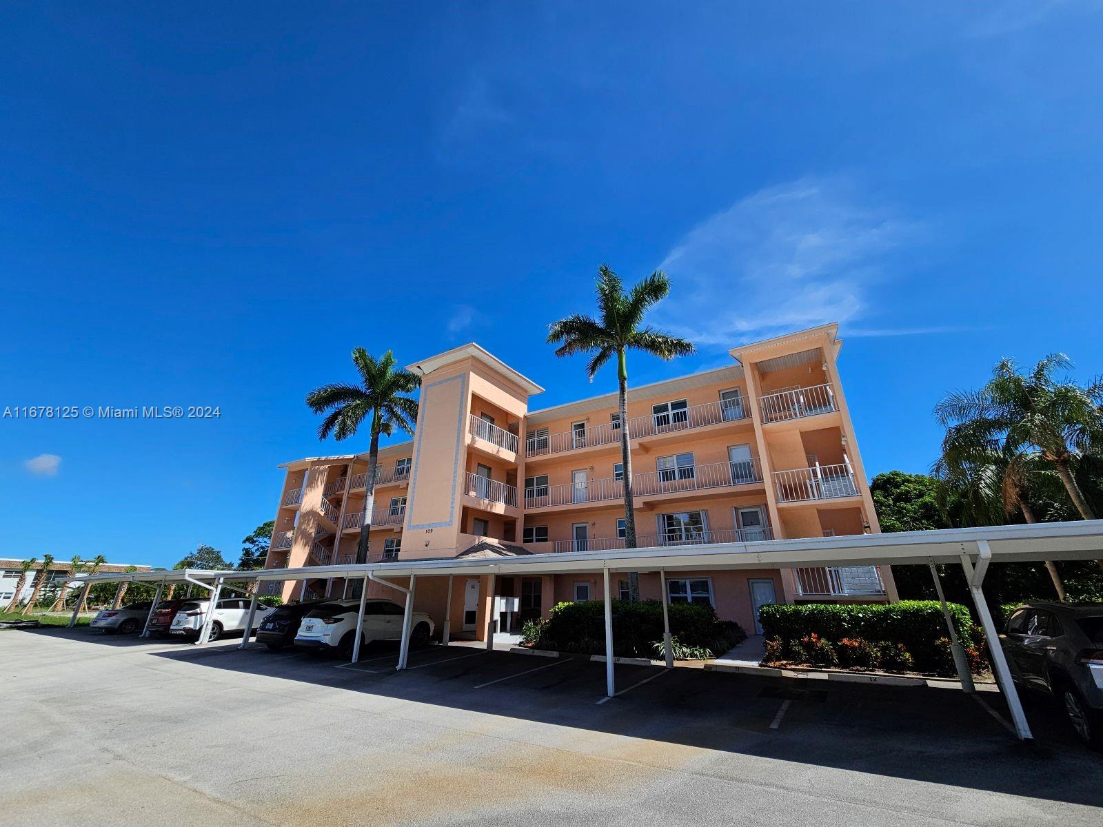 a front view of a building with street view