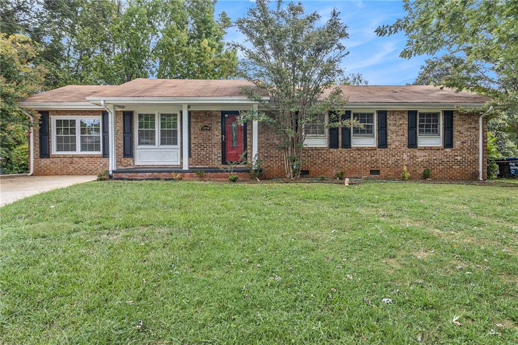 front view of a house with a yard