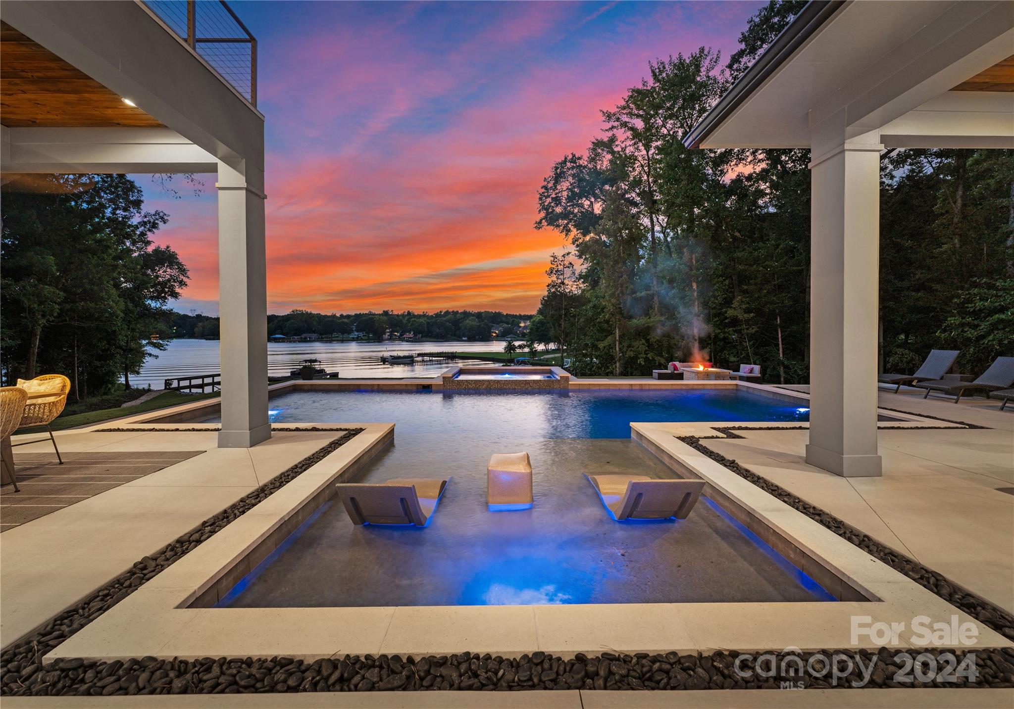 a view of swimming pool with lounge chair