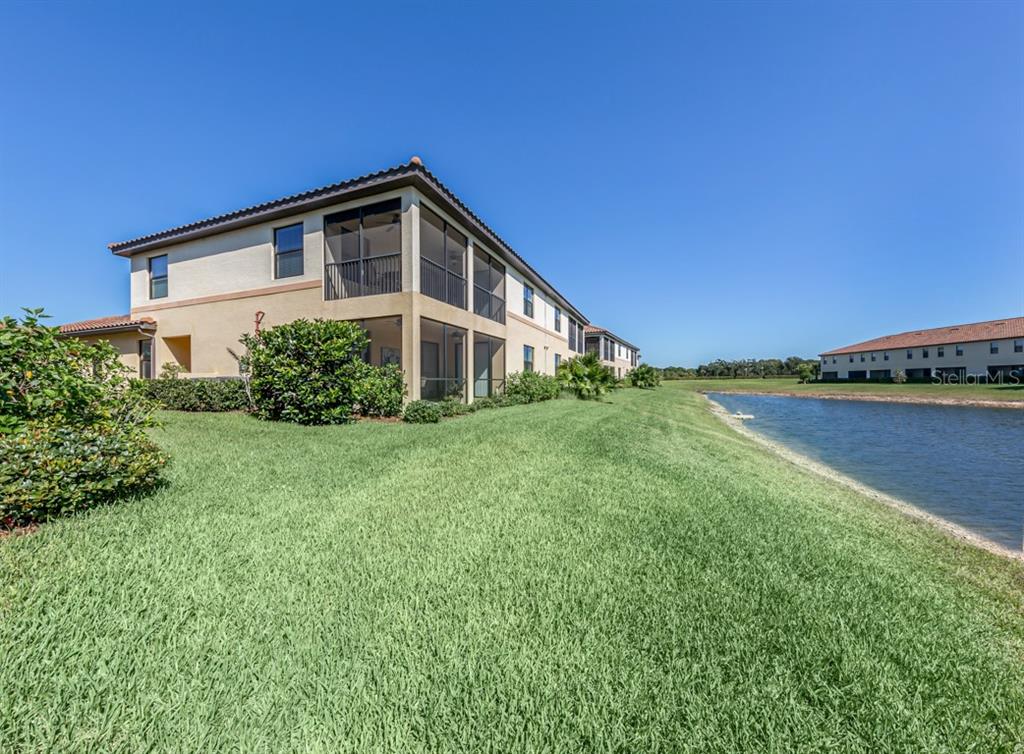 a house with river in front of it