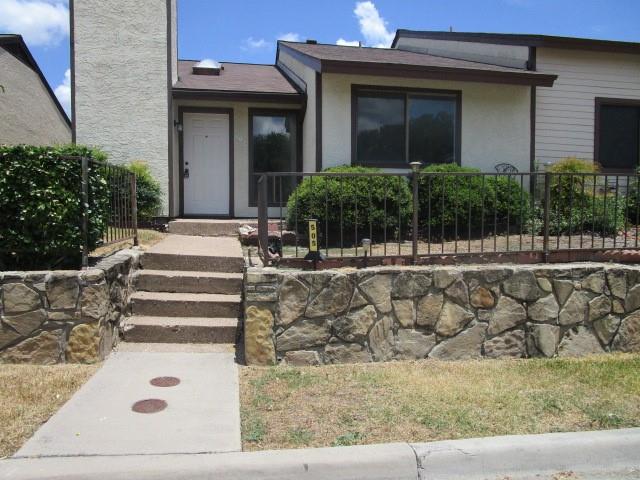 a view of house with outdoor space