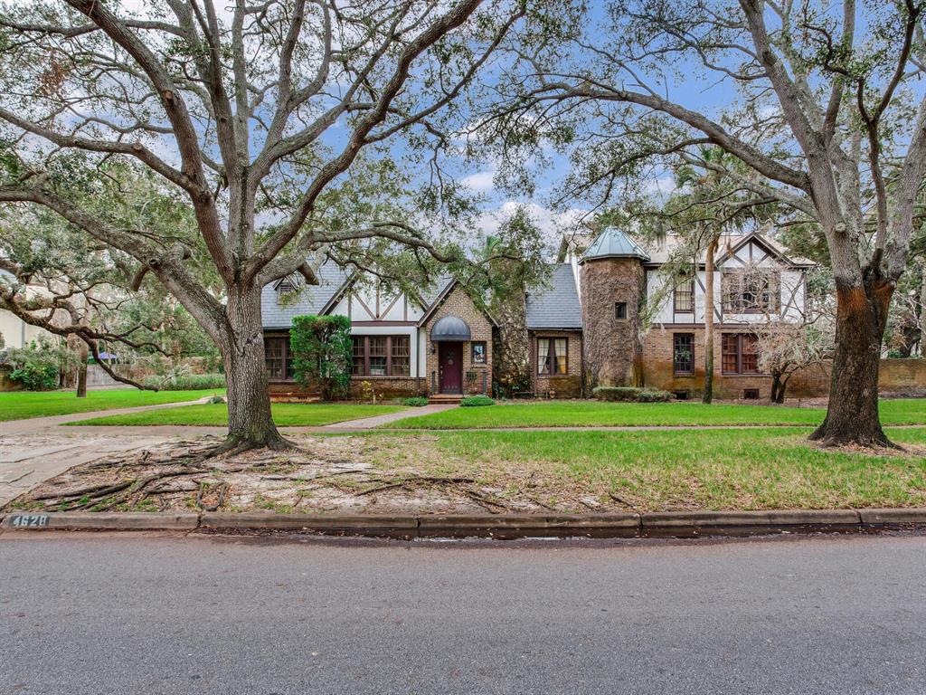 a house with trees in front of it