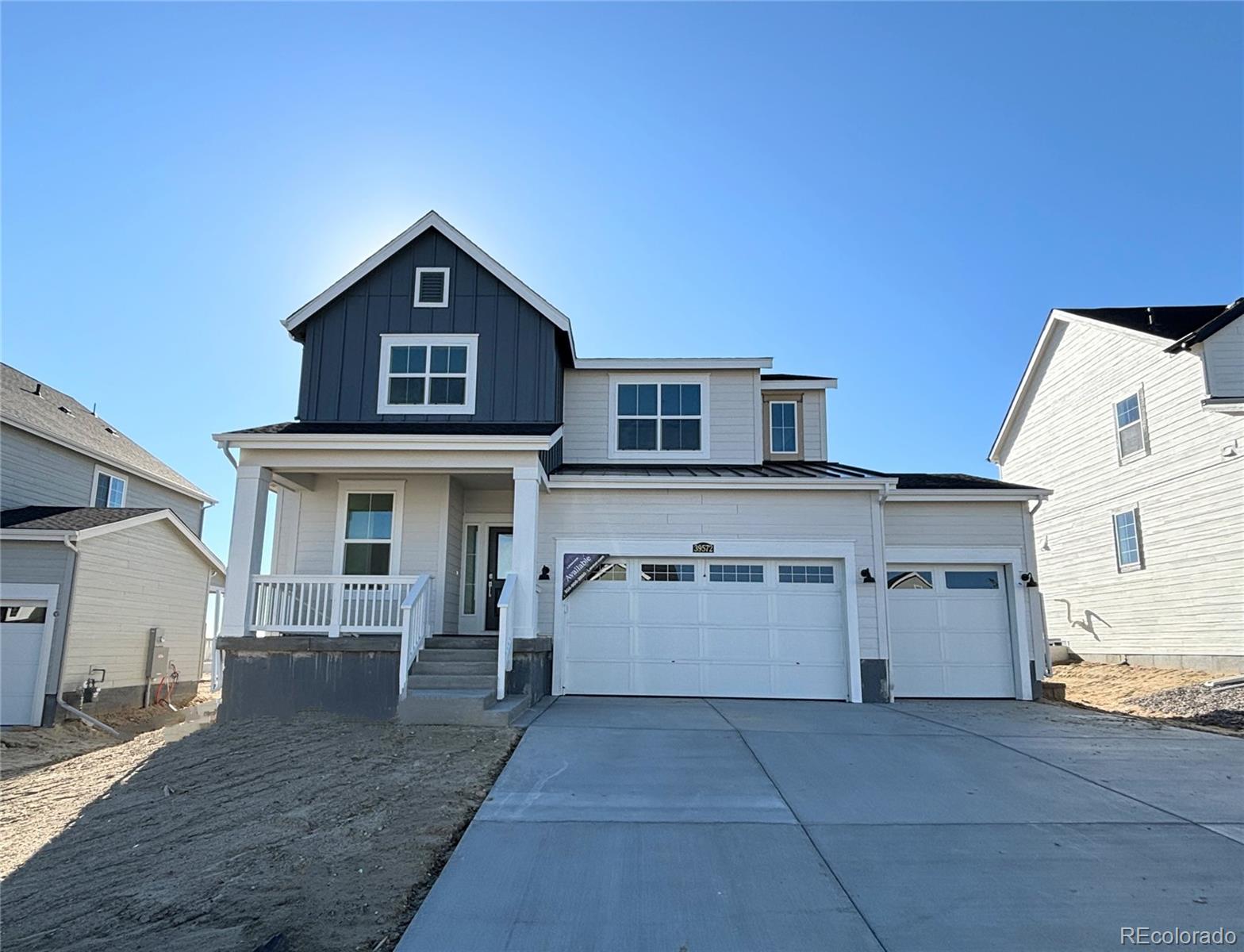 a front view of a house with a garage