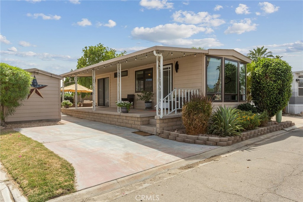 front view of a house with a patio