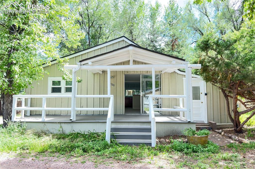 View of front of home with a deck