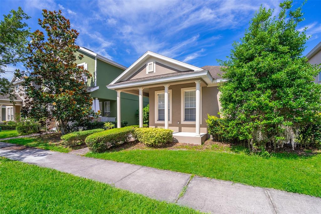 a view of a house with a yard