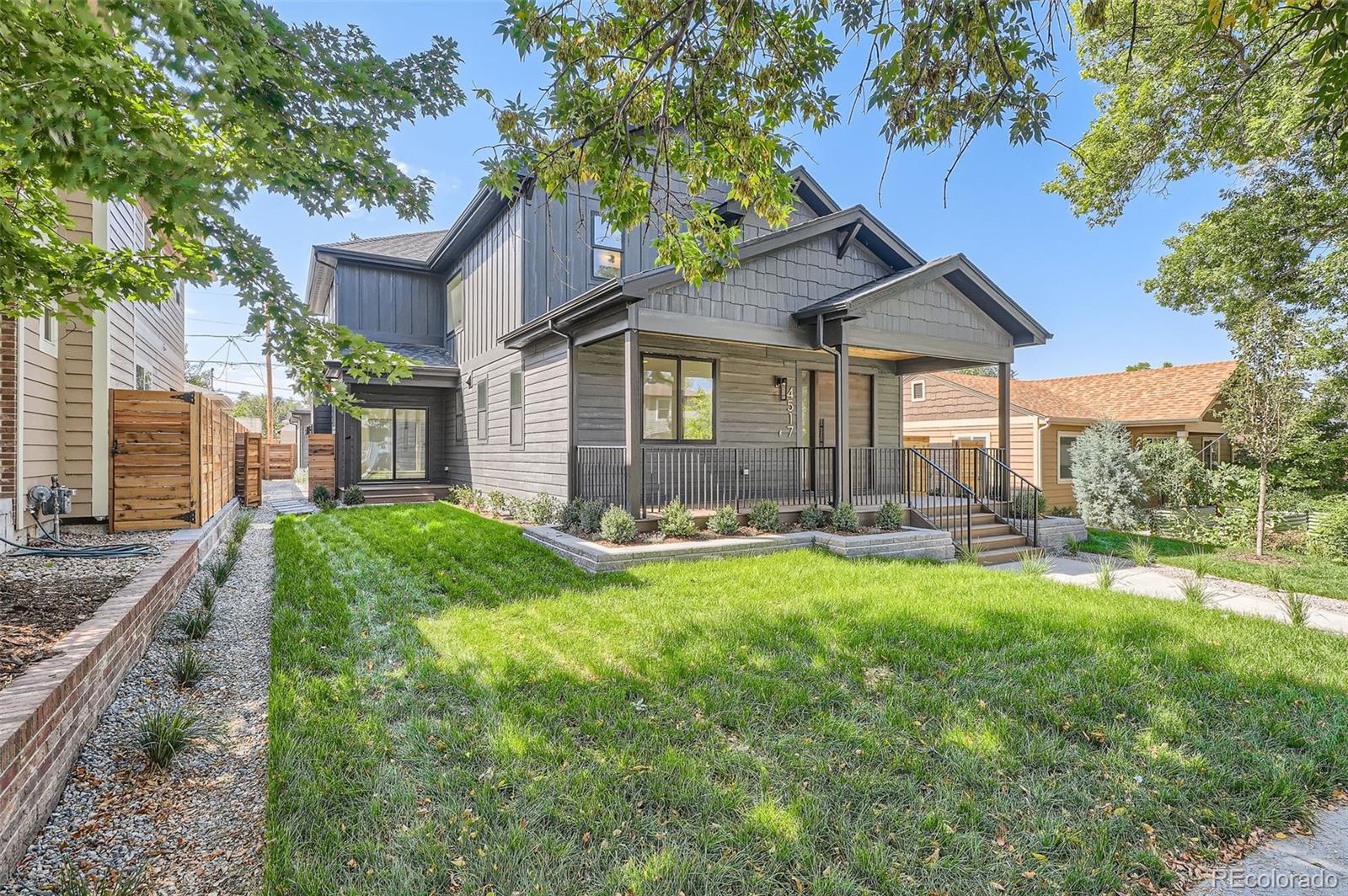 a view of a house with backyard porch and garden