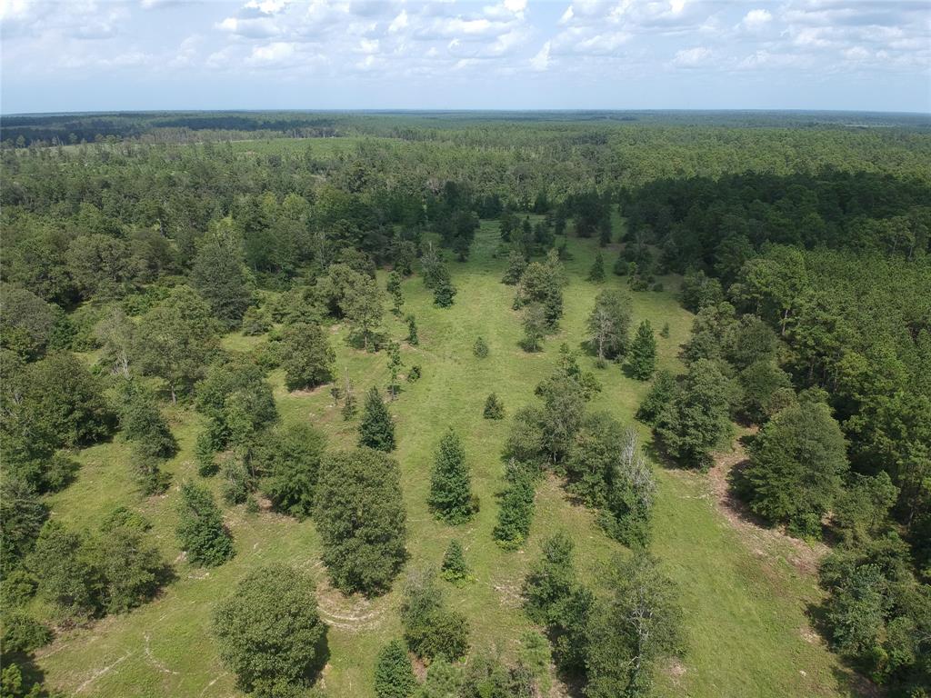 a view of a field with an outdoor space