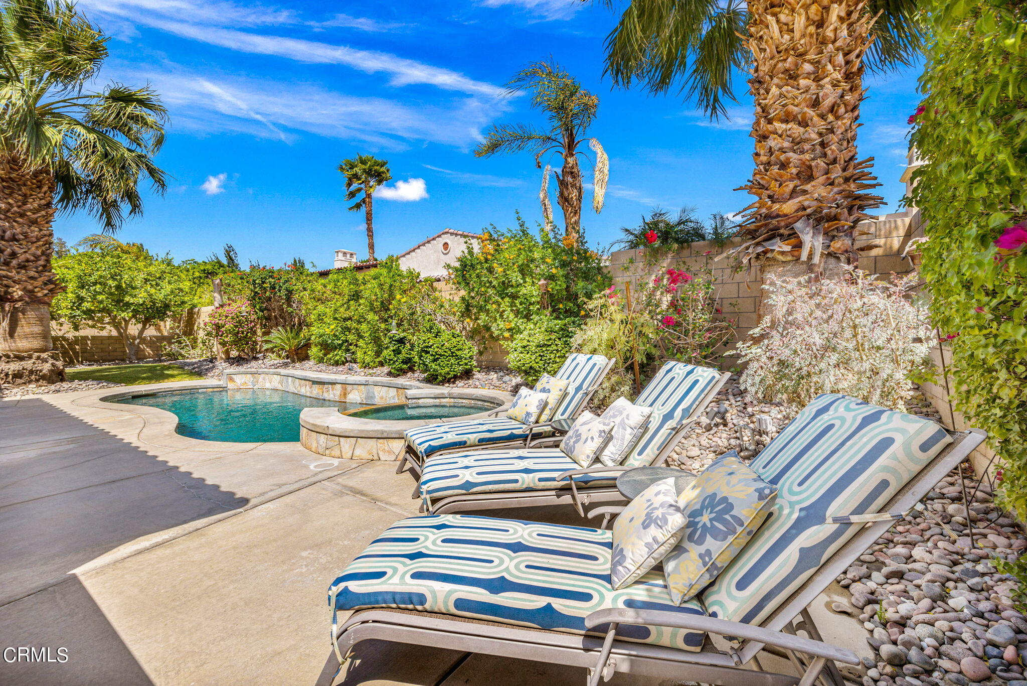 a view of a patio with swimming pool