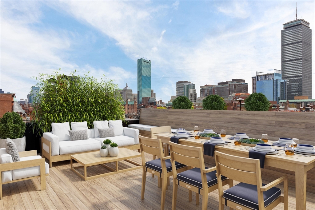 a view of a terrace with sitting area