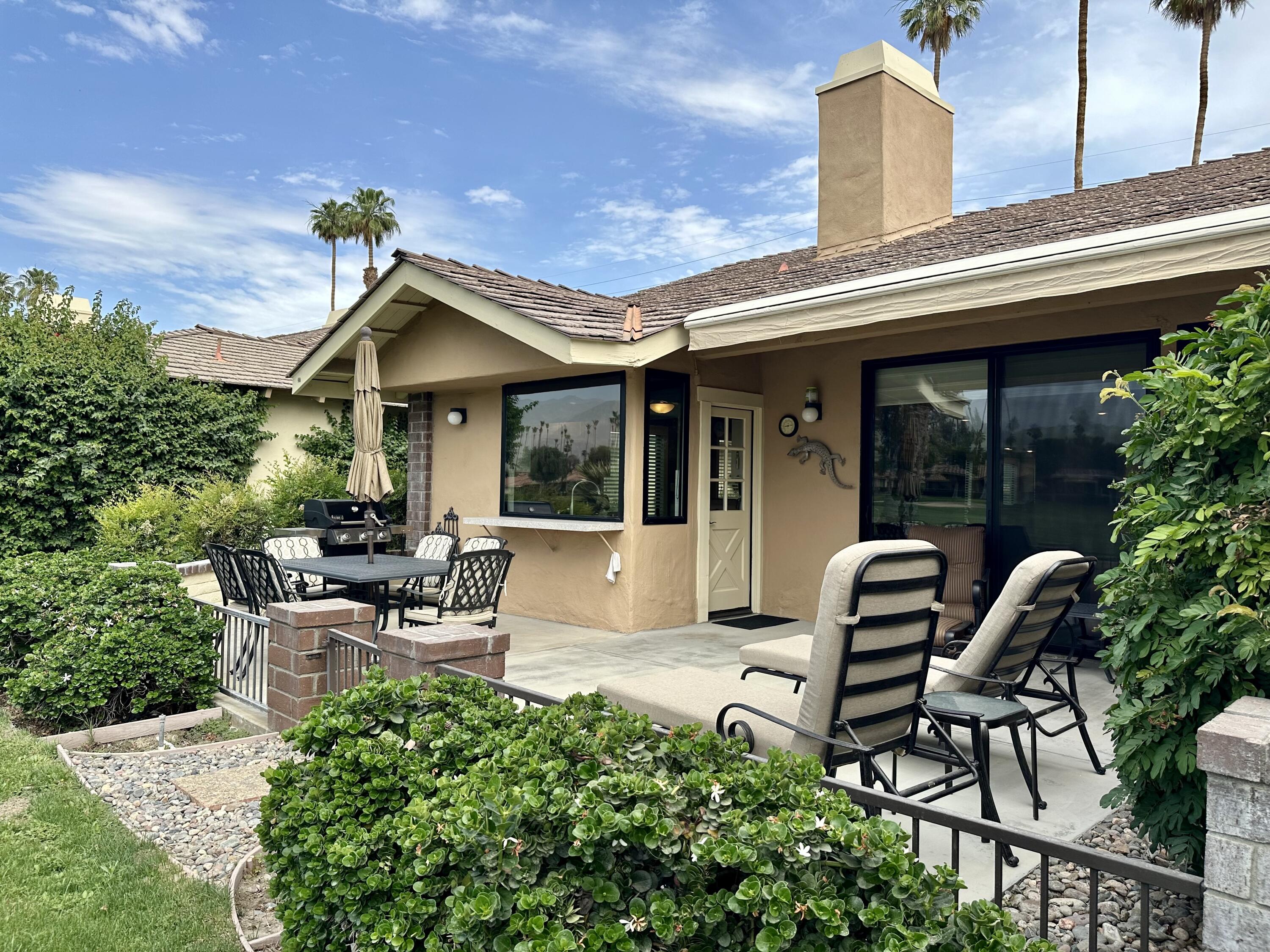 a view of a house with patio