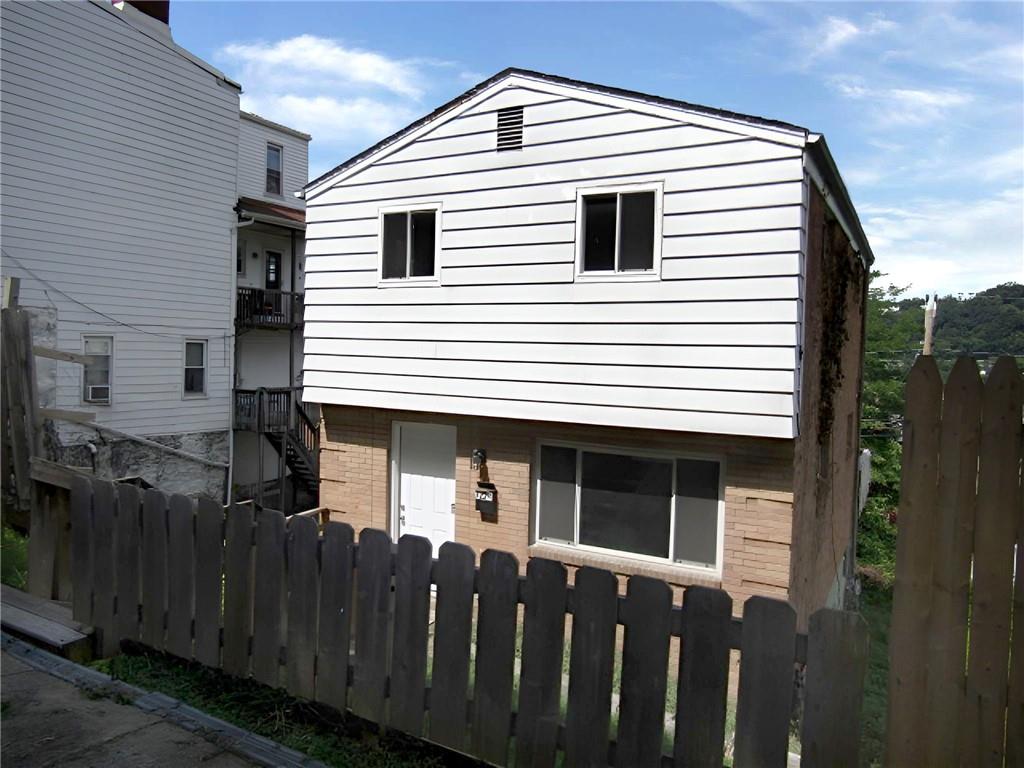 a front view of a house with a balcony