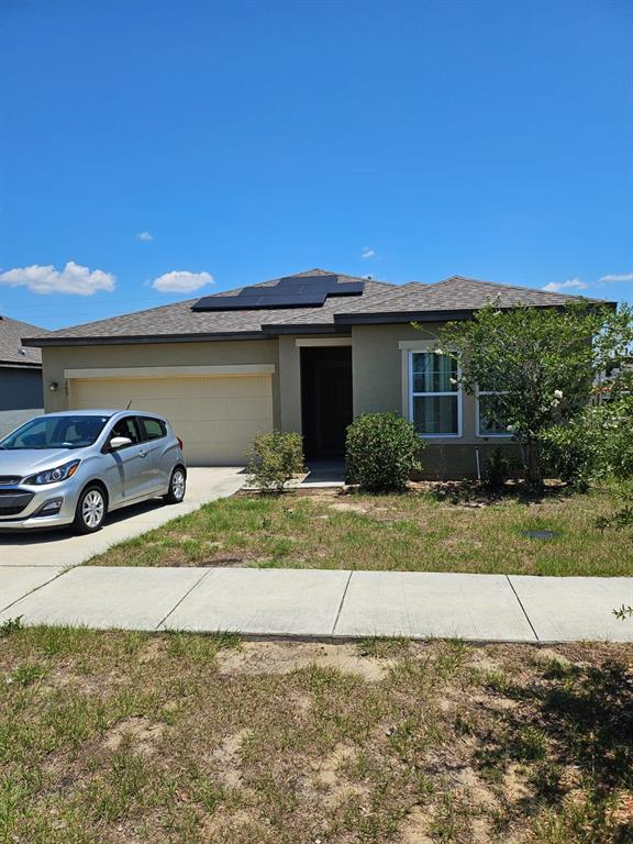 a view of a house with a patio