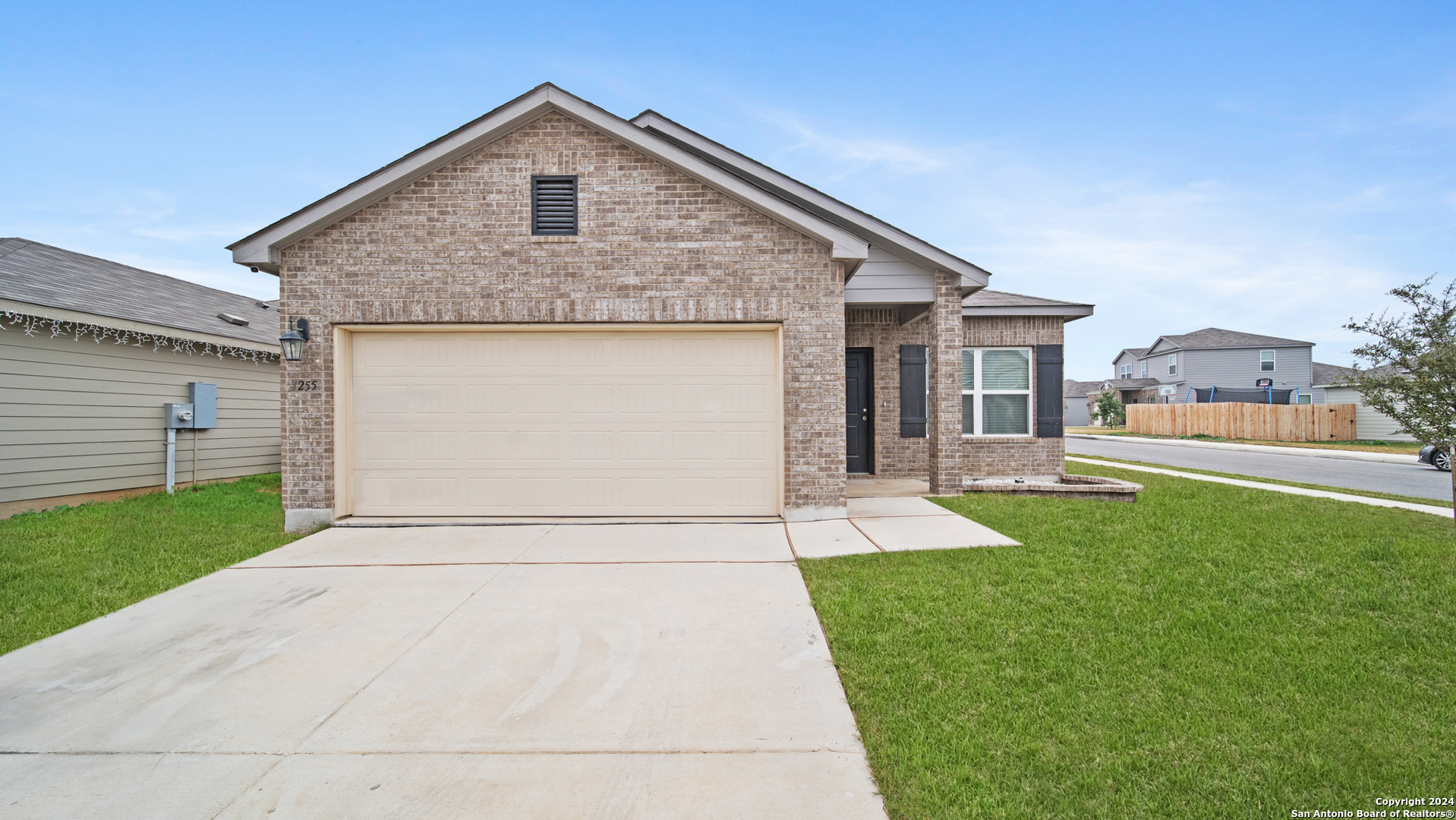 a front view of house with yard