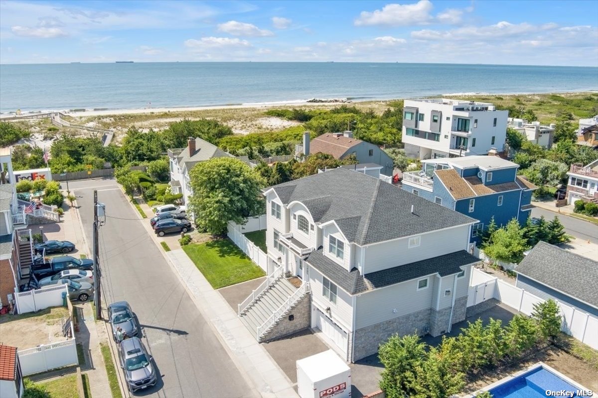 an aerial view of a house with a garden