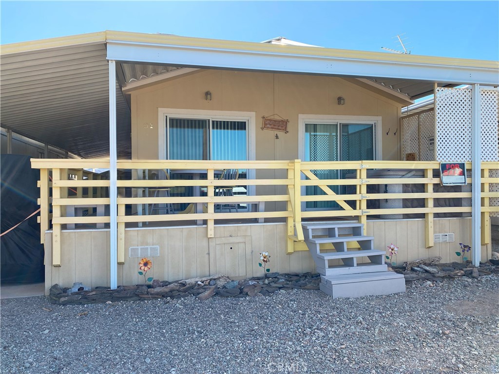 a view of house with outdoor space