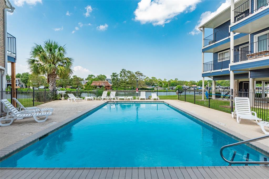 Take a dip in the community's stunning waterfront swimming pool, perfectly positioned to offer refreshing lake breezes and tranquil views of the water.