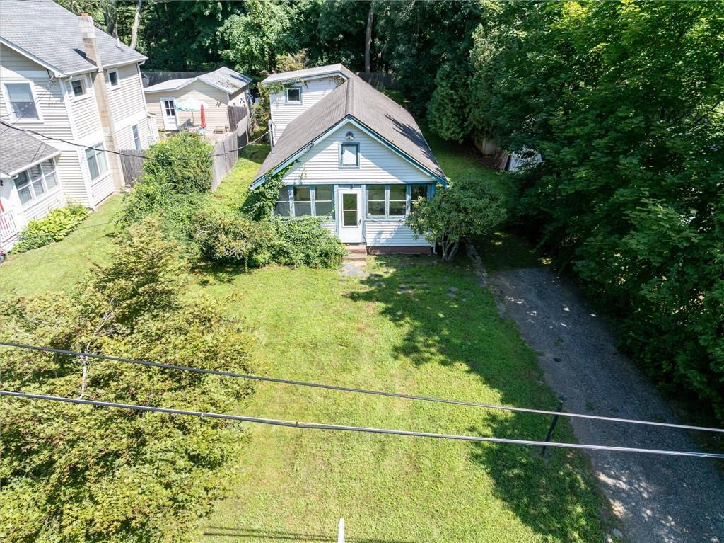 Front with back dormer - house is 4 houses to the lake