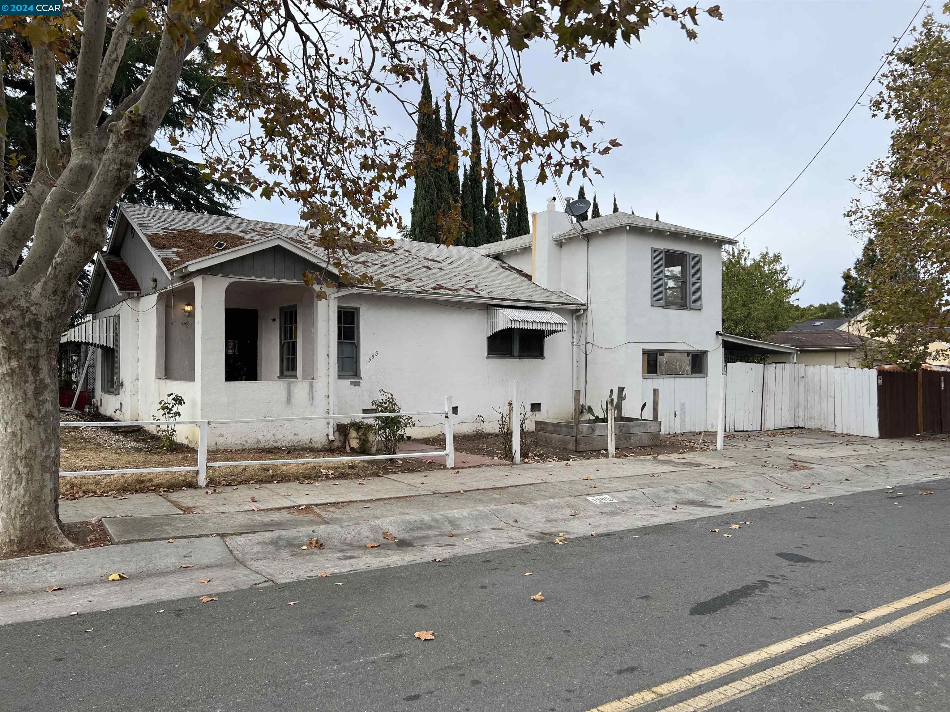 a front view of a house with yard