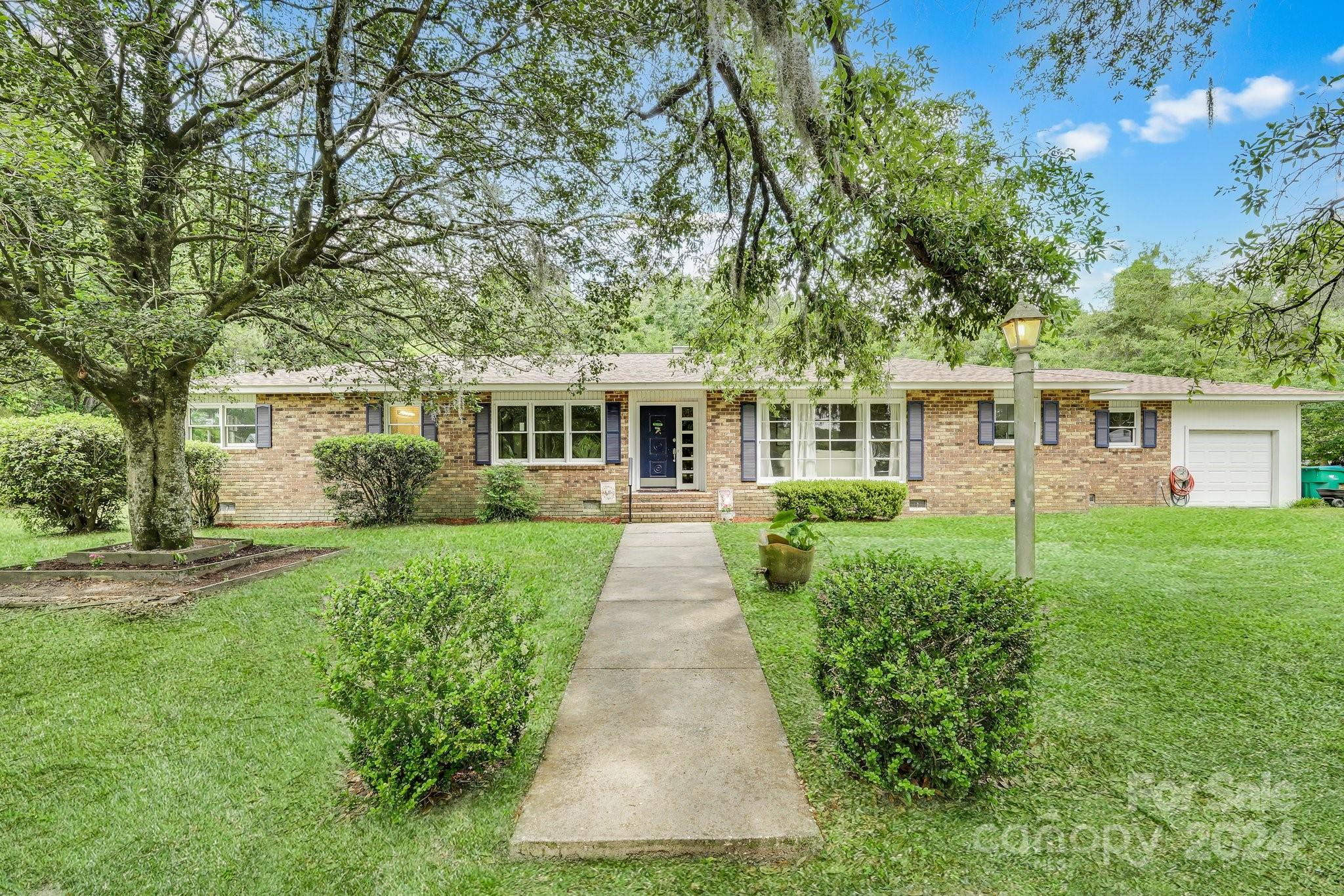 front view of a house and a yard