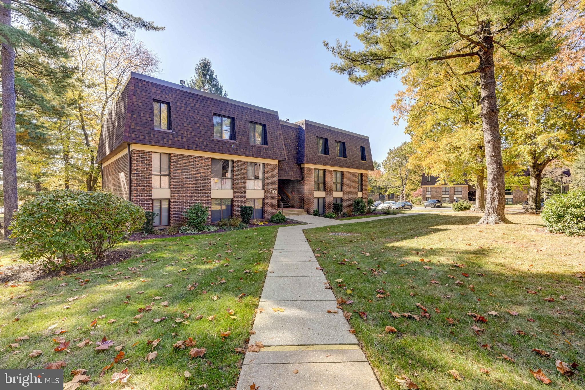 a front view of a building with garden