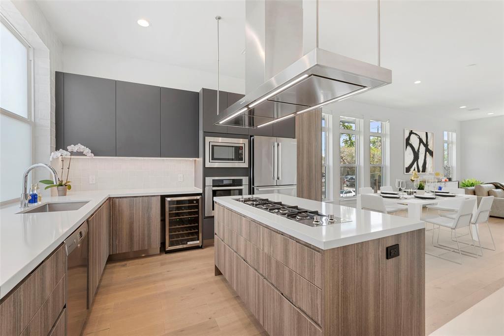 a kitchen with a stove and cabinets