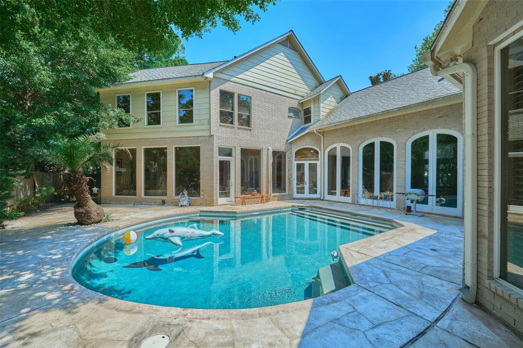 front view of a house with swimming pool