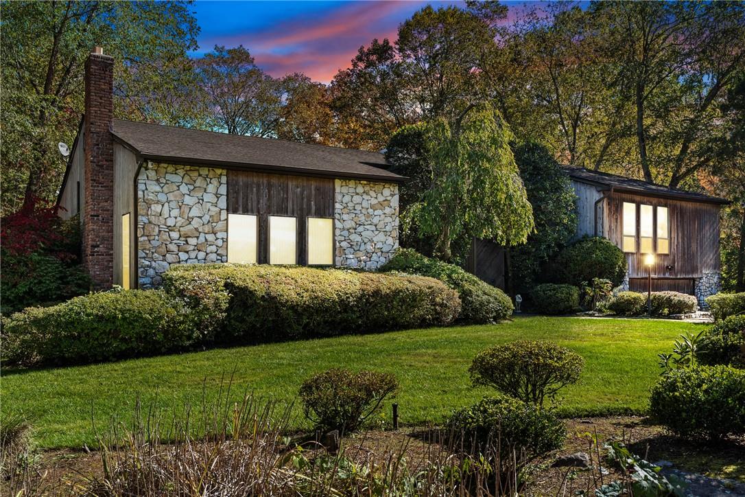 a view of a house with a garden