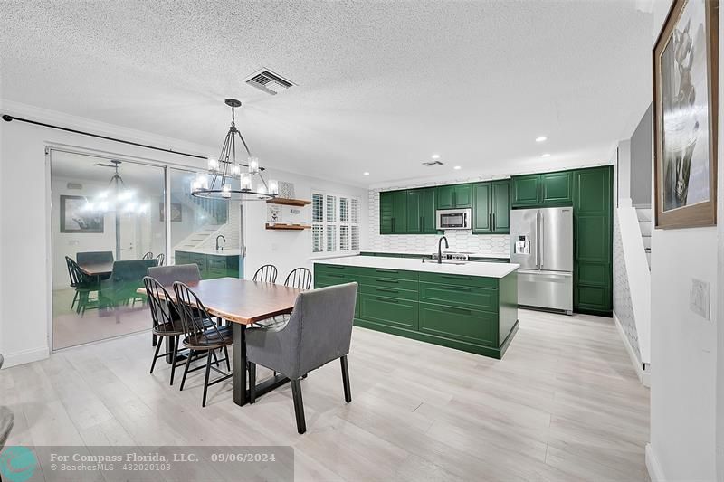 The color is way better in person.  Pictures are not doing this beautiful kitchen Justice.