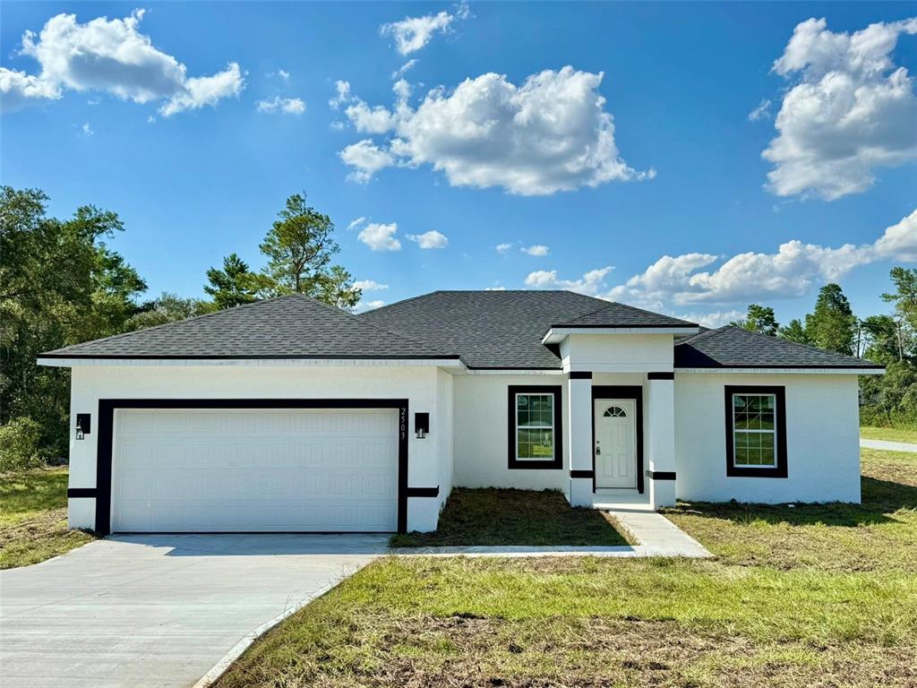 a front view of house with yard