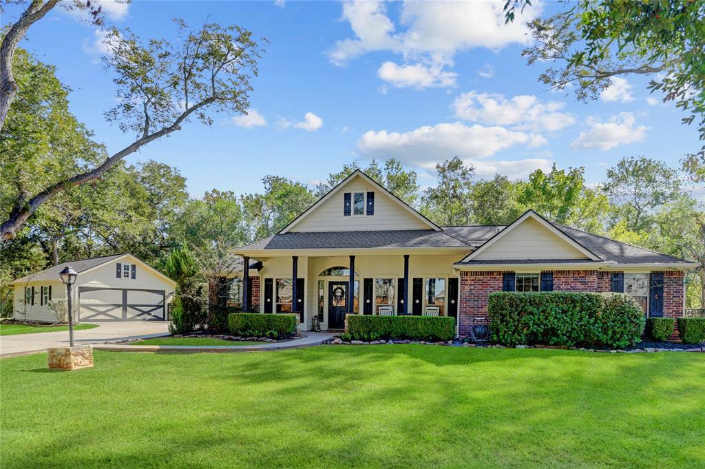 Welcome home! This 2-acre sanctuary is situated right on Jones Creek and features gated entry, detached garage, and covered shed/outbuilding. The property feels private and expansive, yet inviting, perfect for those seeking rural tranquility.