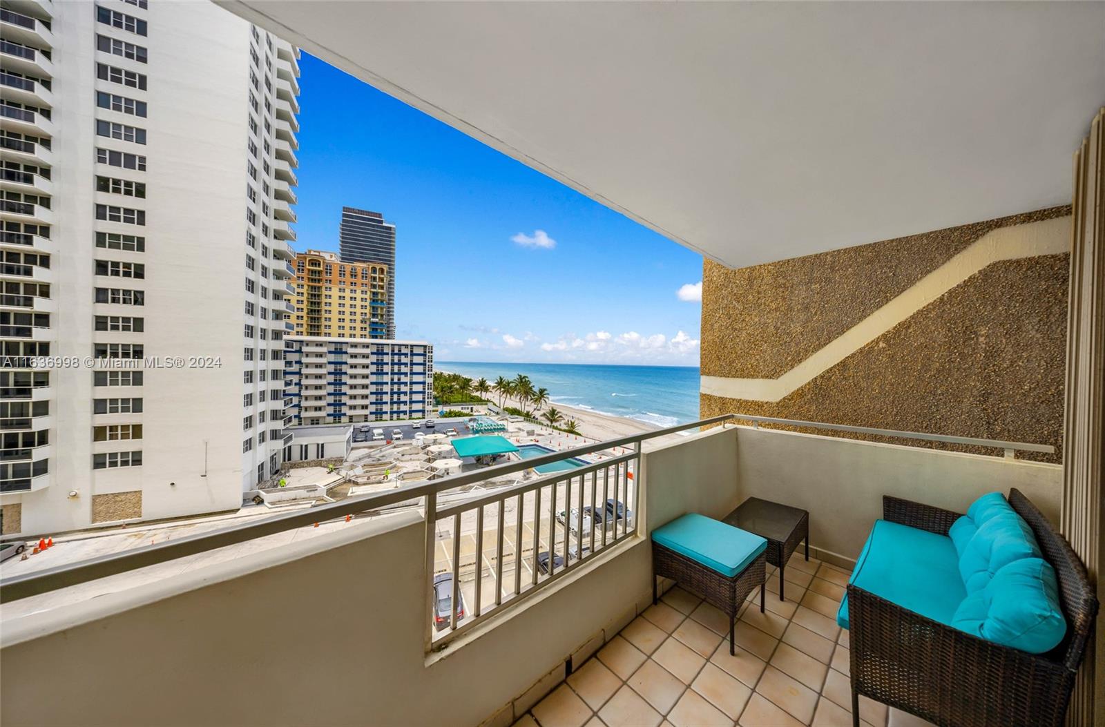 a view of balcony with furniture