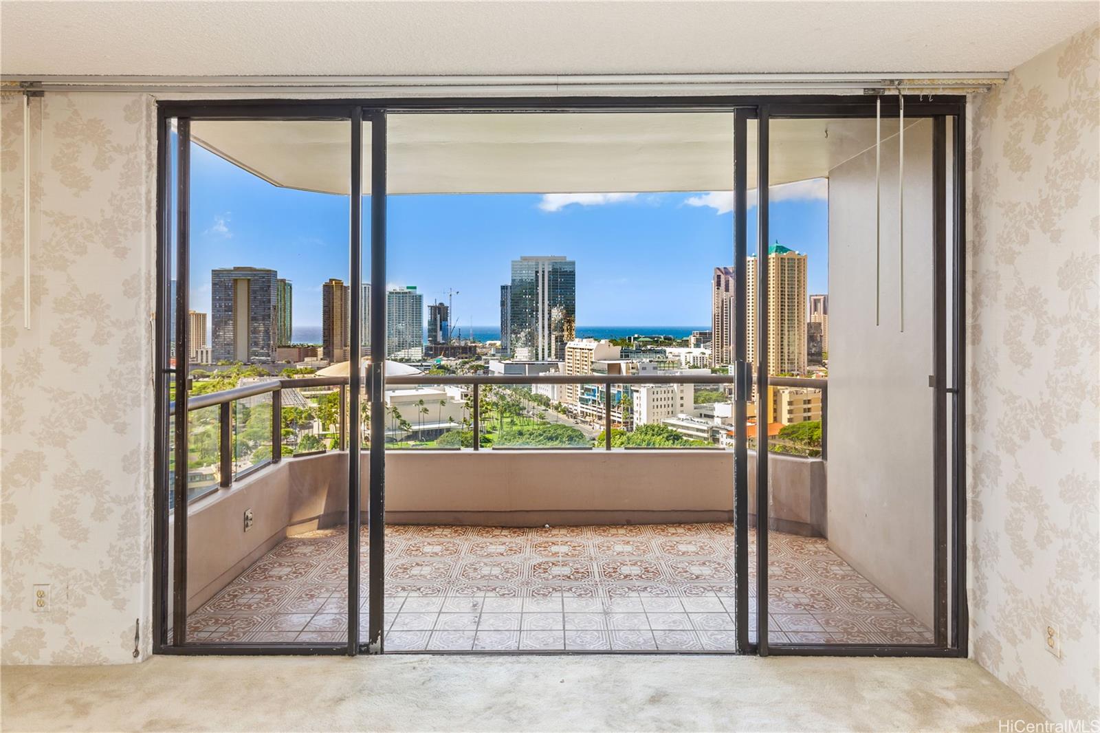 a view of a glass door front of the house