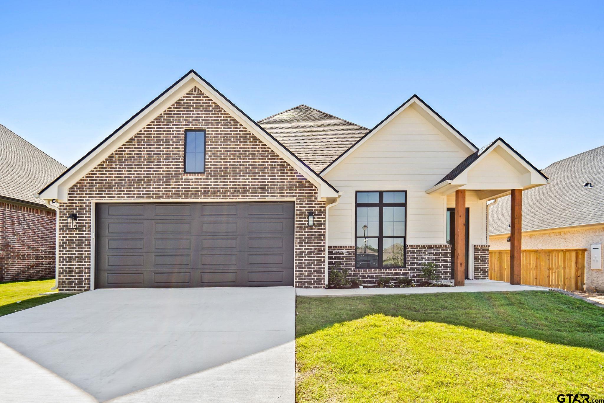 a front view of house with yard