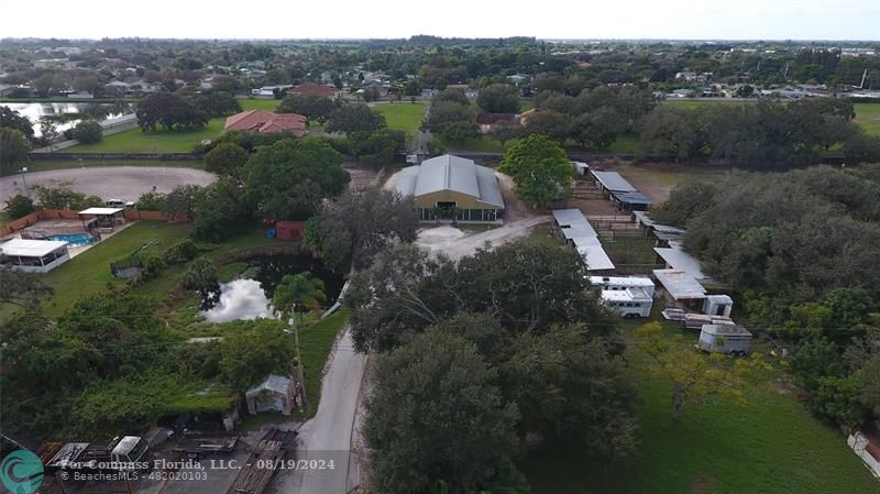 aerial view of a house with a garden