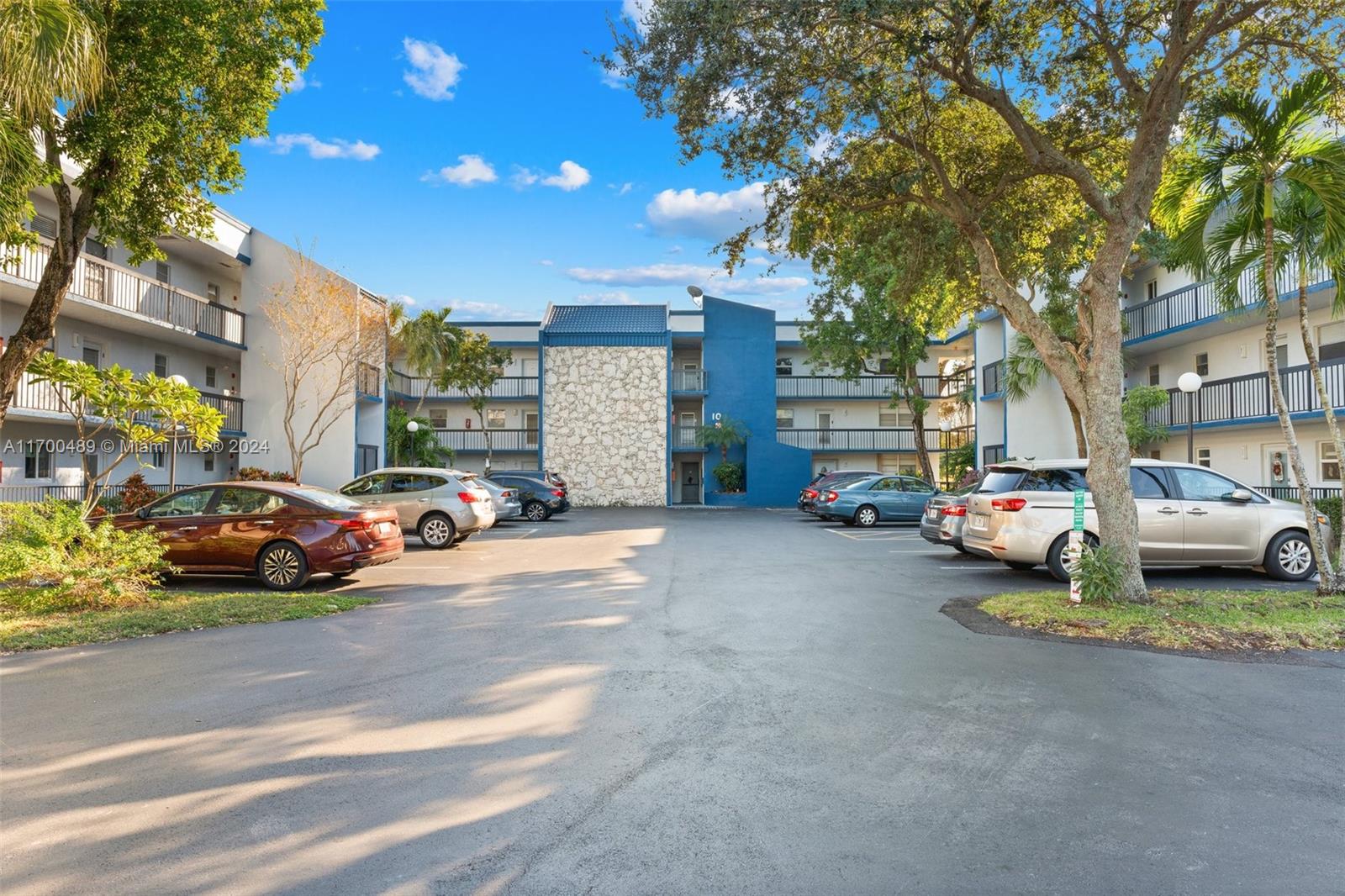 a view of a cars parked in front of a building