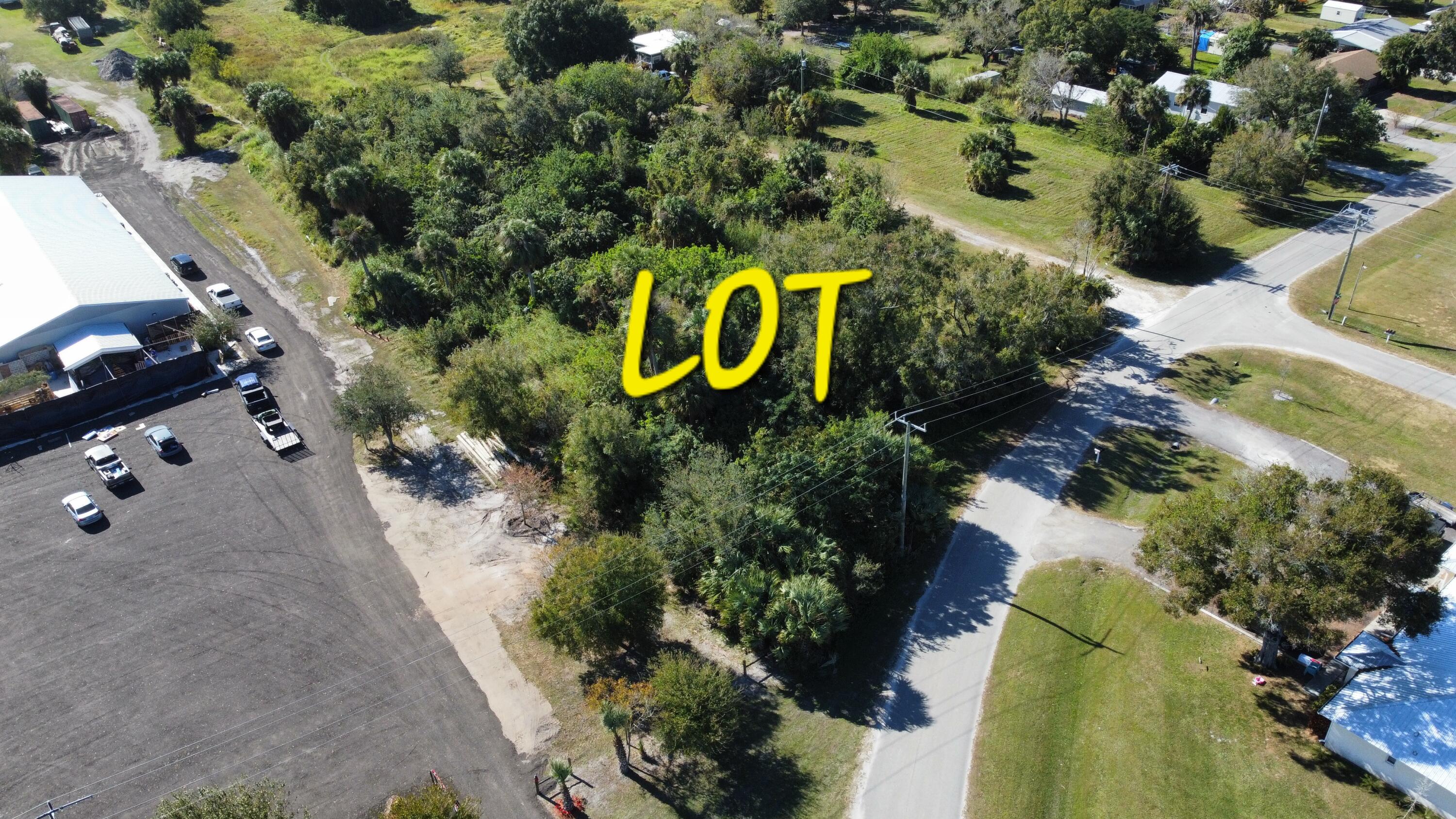 an aerial view of residential house with outdoor space and street view