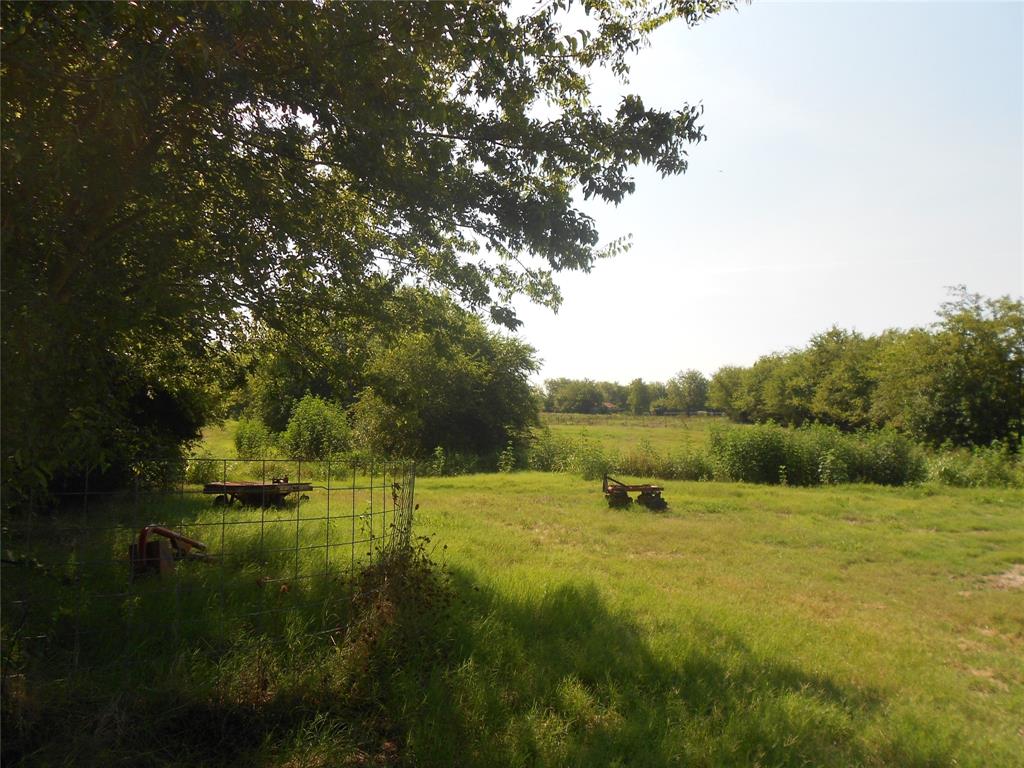 a view of an outdoor space and a yard