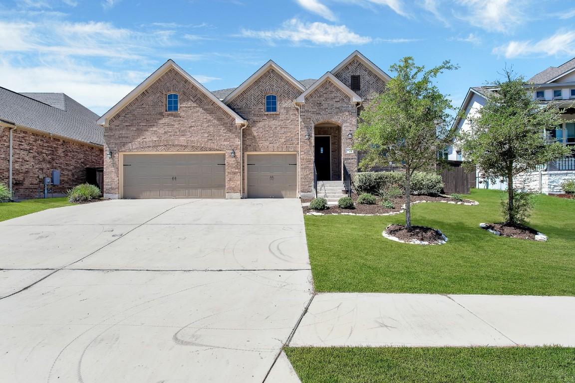 a front view of house with yard