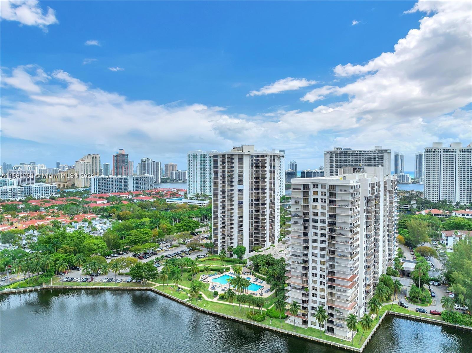 a view of a city with tall buildings