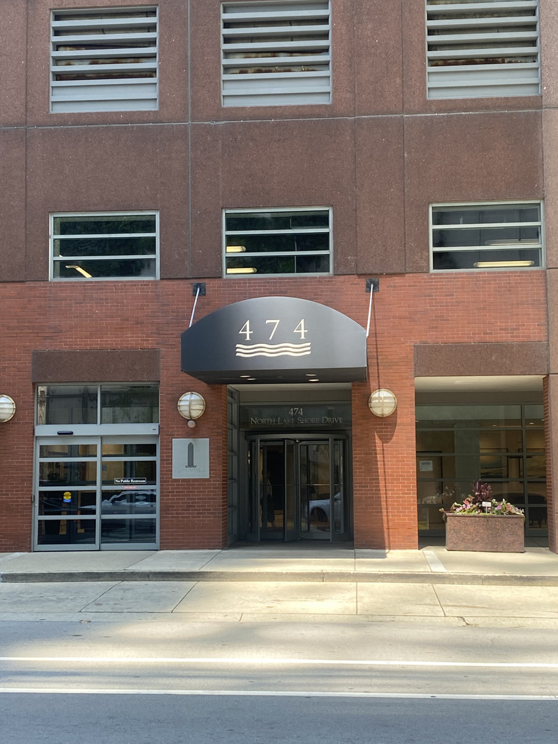 a view of a building with car windows